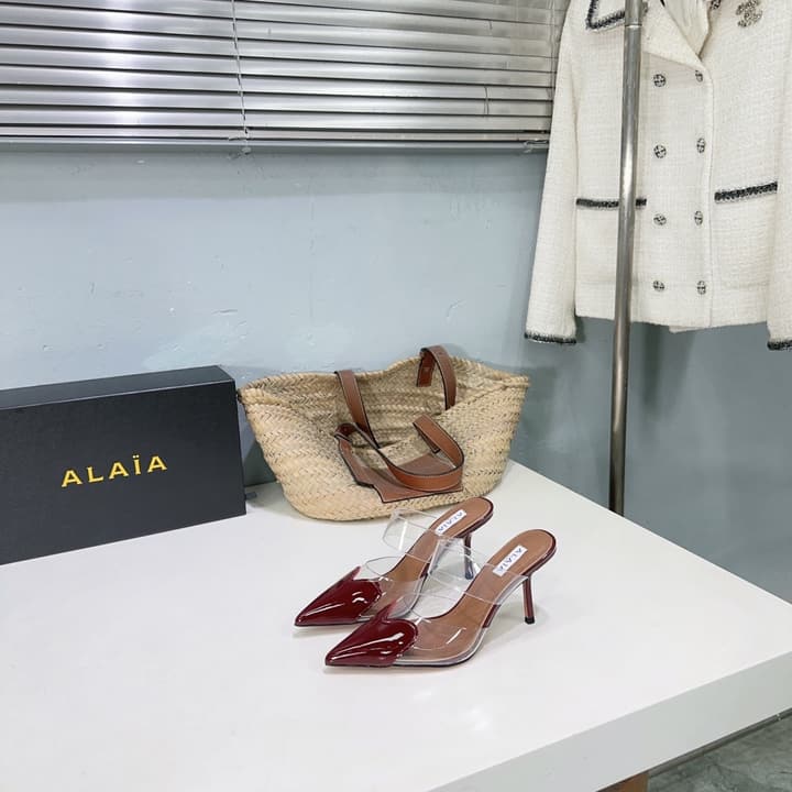 Alaïa Heart PVC Pointed Toe Slingback Mules – Spring/Summer 2025 in Red Patent Toe / Clear Pvc