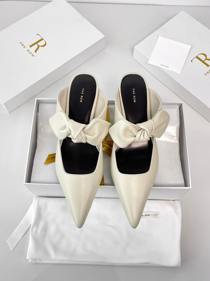 The Row Leather Bow Mules in Black Leather
