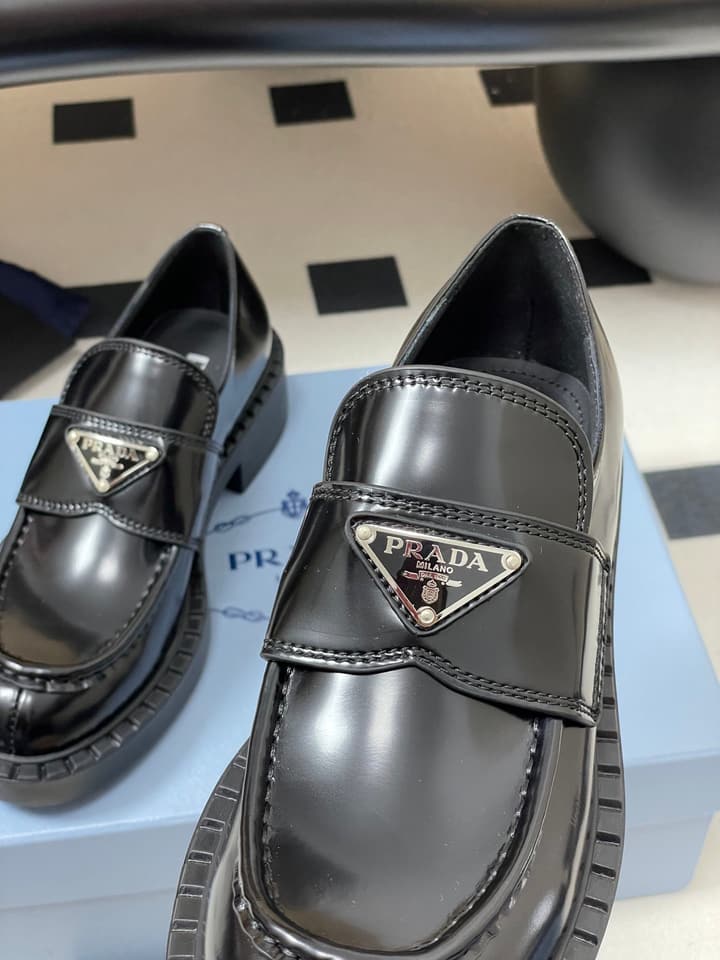 Prada Triangle Logo Platform Loafers in Black