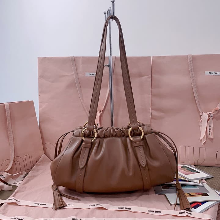 Miu Miu Tassel Drawstring Bucket Bag – New Collection in Black
