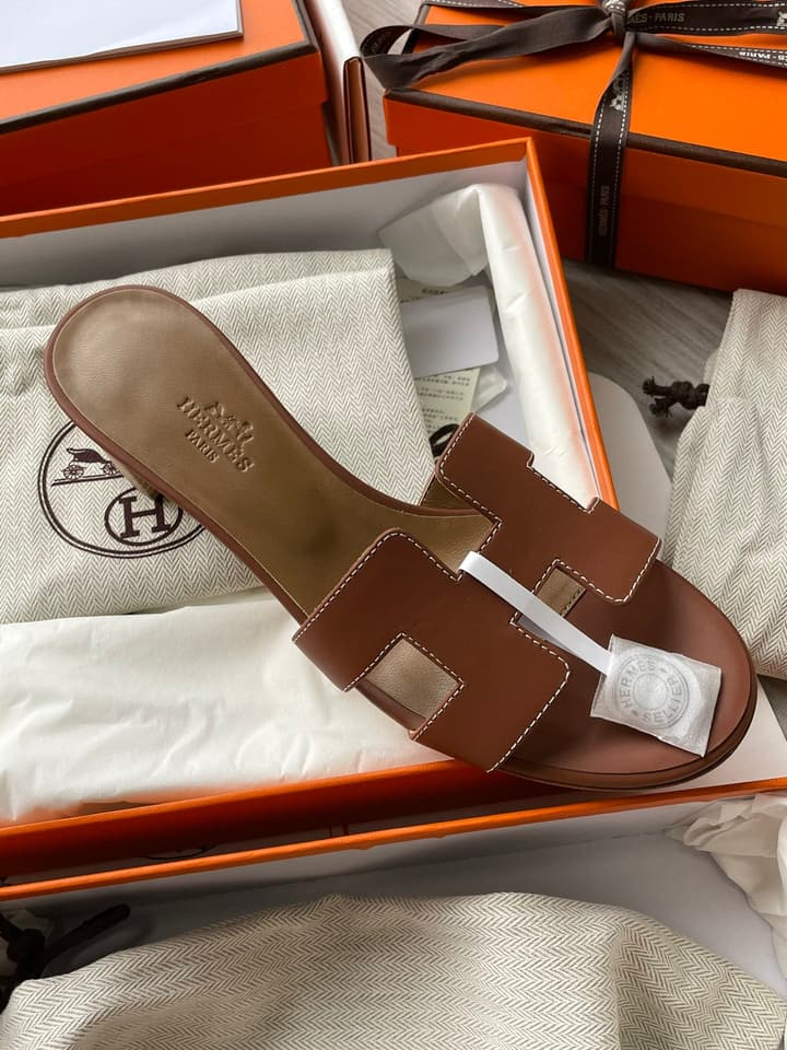 Hermès Classic H Slippers in Cream Leather