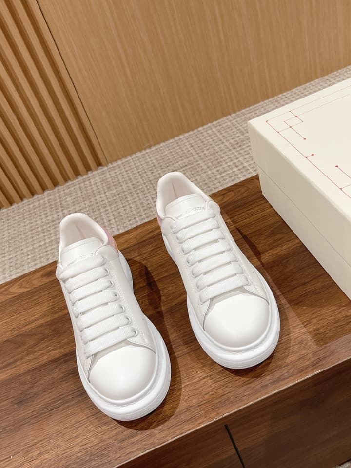 Alexander McQueen Classic Versatile White Sneakers in White With Black Laces & Heel