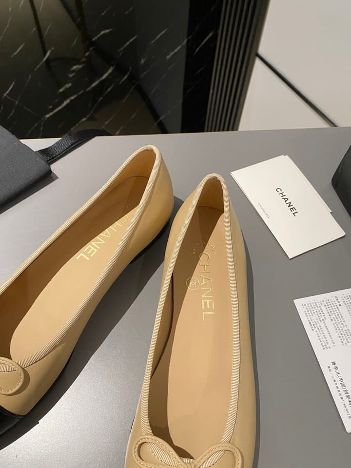 Chanel Classic Ballet Flats in Tan With Black Cap Toe