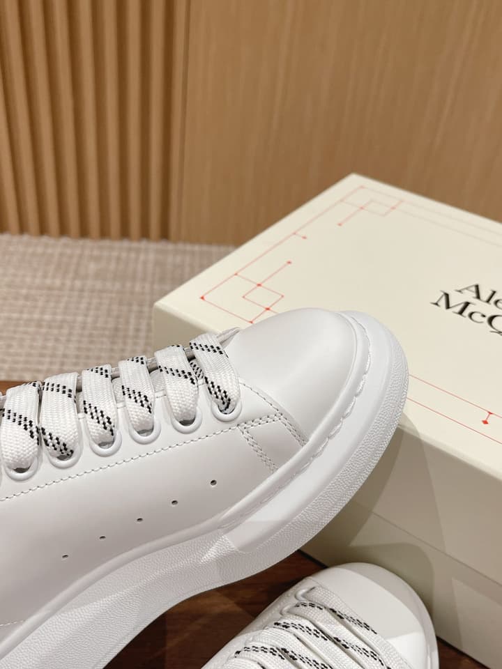 Alexander McQueen Classic Versatile White Sneakers in White With Black Laces & Heel