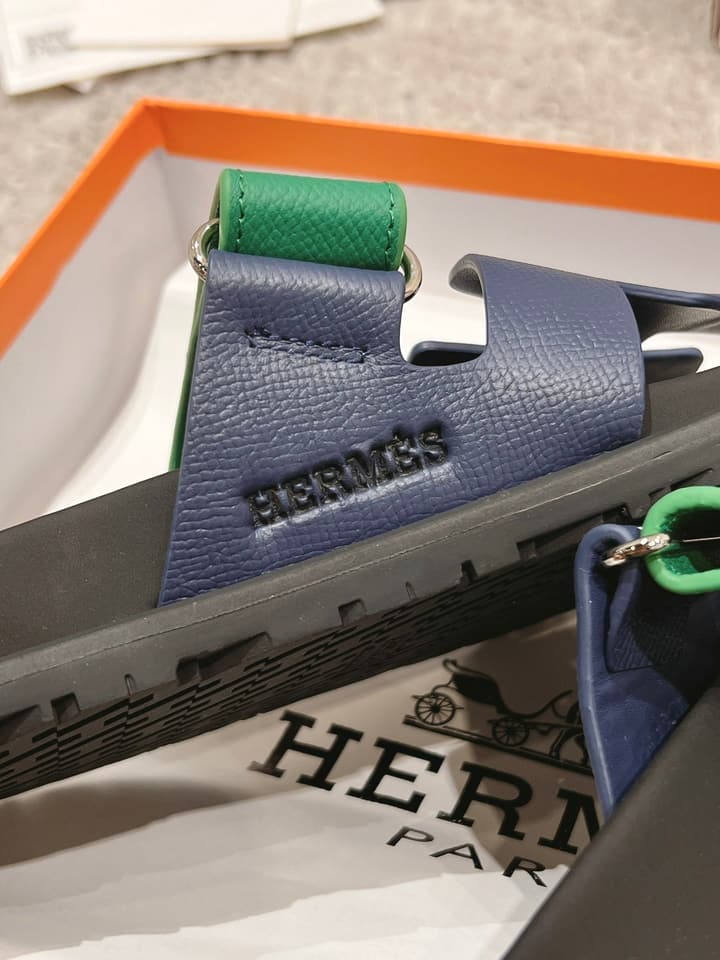 Hermès Chypre Suede Unisex Slides in Black With Dark Blue Strap