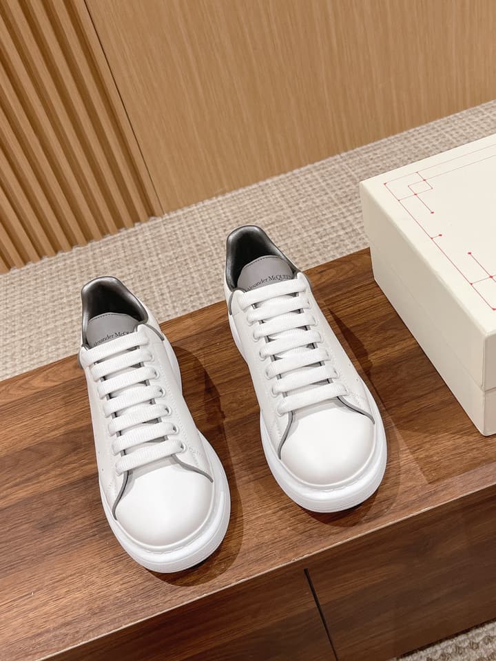 Alexander McQueen Classic Versatile White Sneakers in White With Black Laces & Heel