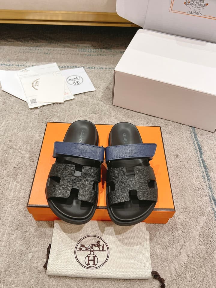 Hermès Chypre Suede Unisex Slides in Black With Dark Blue Strap