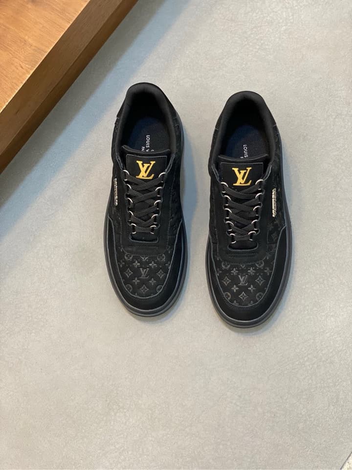 Louis Vuitton Embossed Calfskin Sneakers in Black