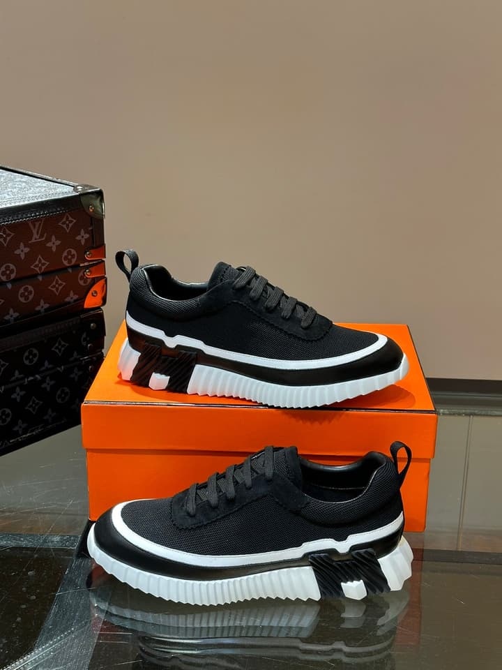 Hermès Bouncing Calfskin Mesh Sneakers in Black With White Stripe