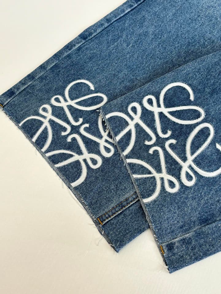 Loewe Anagram Laser-Cut Denim Shorts in Blue Denim
