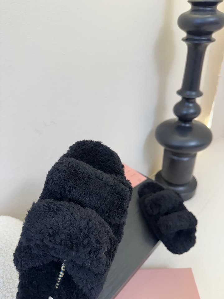 Miu Miu Sheepskin Mules in Black