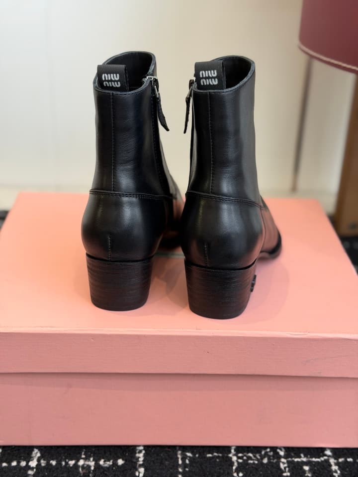 Miu Miu Distressed Leather Biker Boots – 2026SS