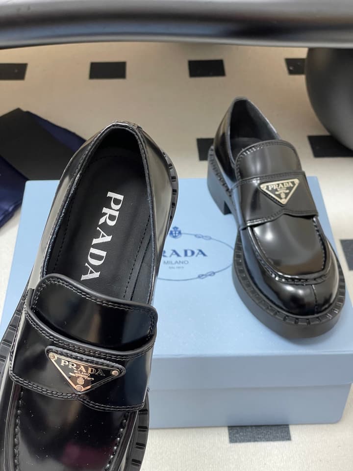 Prada Triangle Logo Platform Loafers in Black