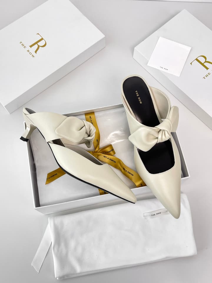 The Row Leather Bow Mules in Black Leather