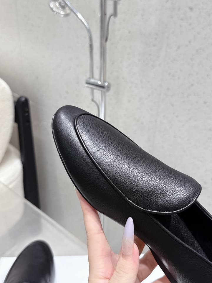 The Row Tassel Loafers in Black Suede