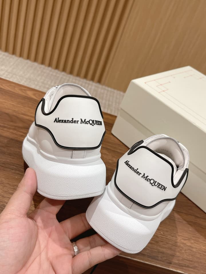 Alexander McQueen Classic Versatile White Sneakers in White With Black Laces & Heel