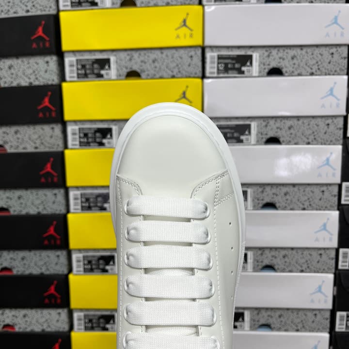 Alexander McQueen Oversized Low-Top Sneakers in All Black With White Sole