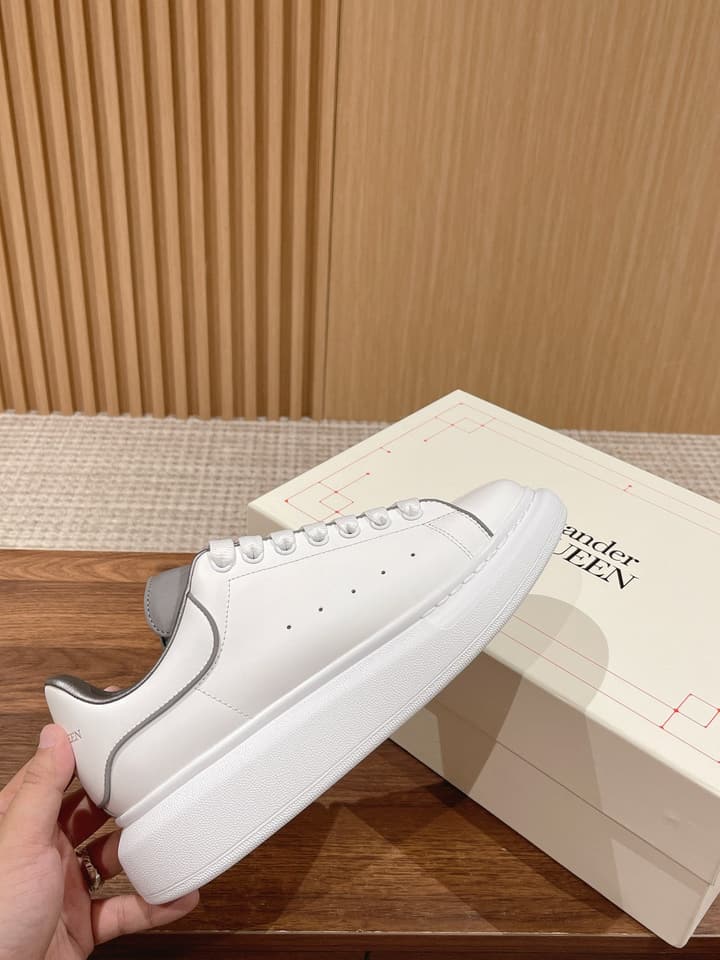 Alexander McQueen Classic Versatile White Sneakers in White With Black Laces & Heel