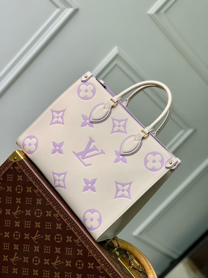 Louis Vuitton ONTHEGO Medium Tote Bag in Cream/white Monogram With Lilac Print