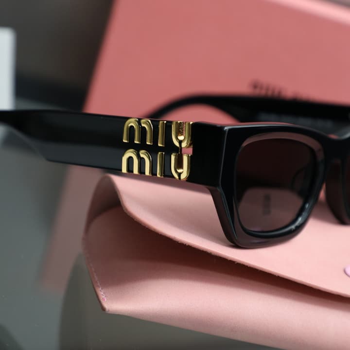 Miu Miu 2025 Cat-Eye Sunglasses – 2025 Collection in Gold
