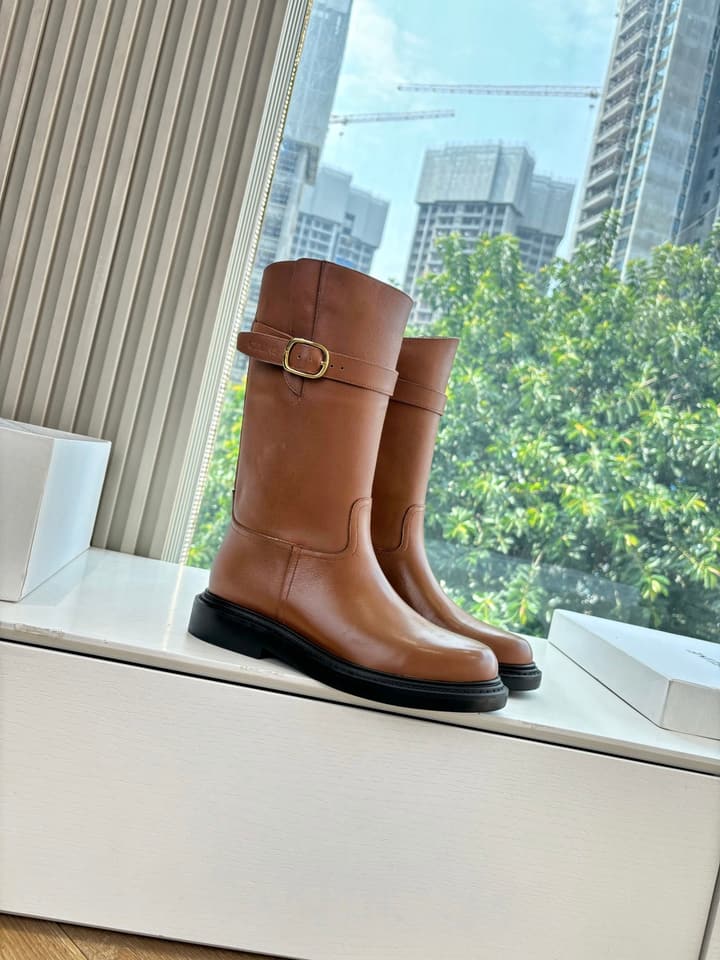 Celine Triomphe Knight Ankle Boots – 2025 Fall/Winter Collection in Black And Brown Leather Display