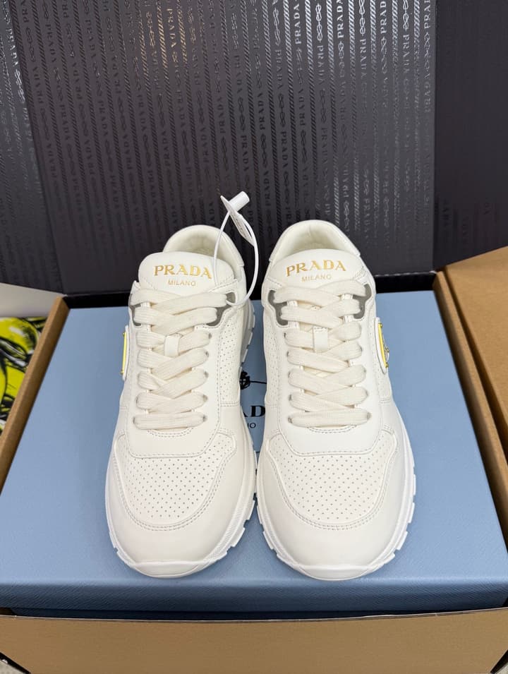 Prada Triangle Logo Sporty Sneakers – 2025 Early Autumn Collection in Black