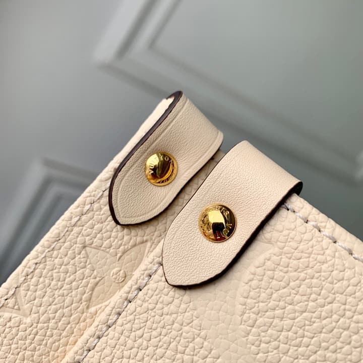 Louis Vuitton OnTheGo Medium Monogram Empreinte Tote in Cream Monogram Empreinte