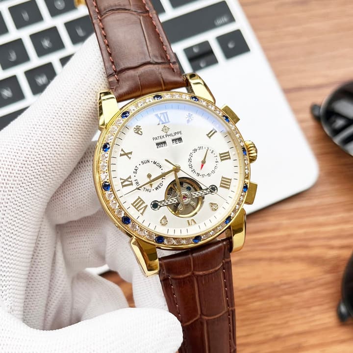 Patek Philippe Men's Automatic Watch in Gold