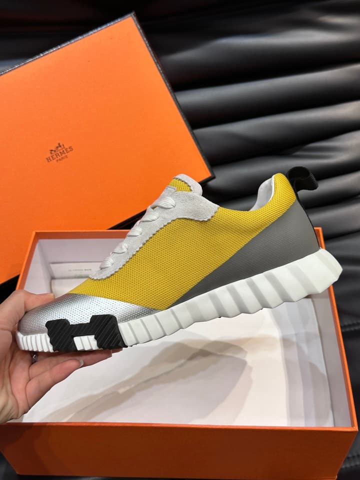Hermès Bouncing Calfskin Mesh Sneakers in Black With White Stripe