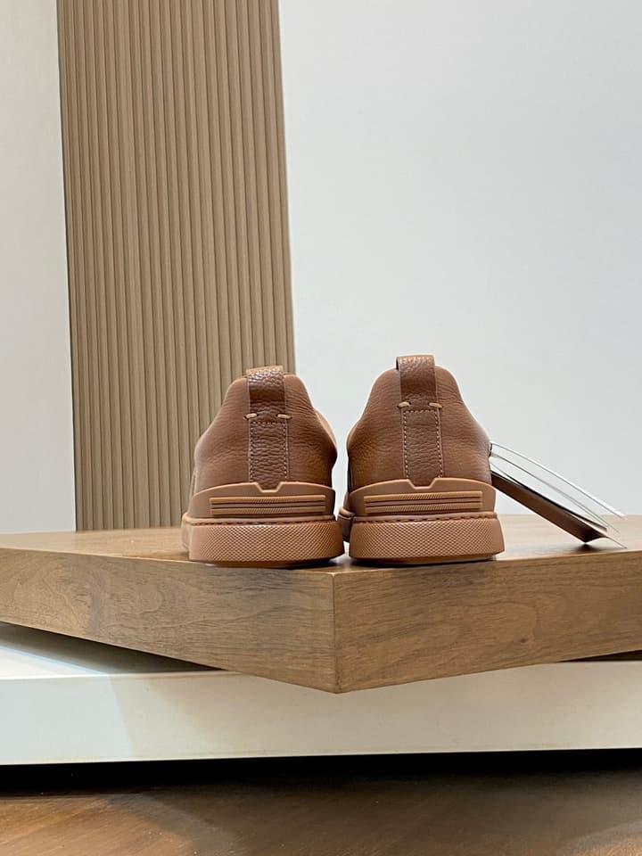 Ermenegildo Zegna Triple Stitch Sneakers in Black Leather With Brown Tag