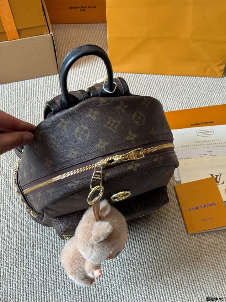 Louis Vuitton Monogram Mini Backpack in Monogram With Light Blue Charm