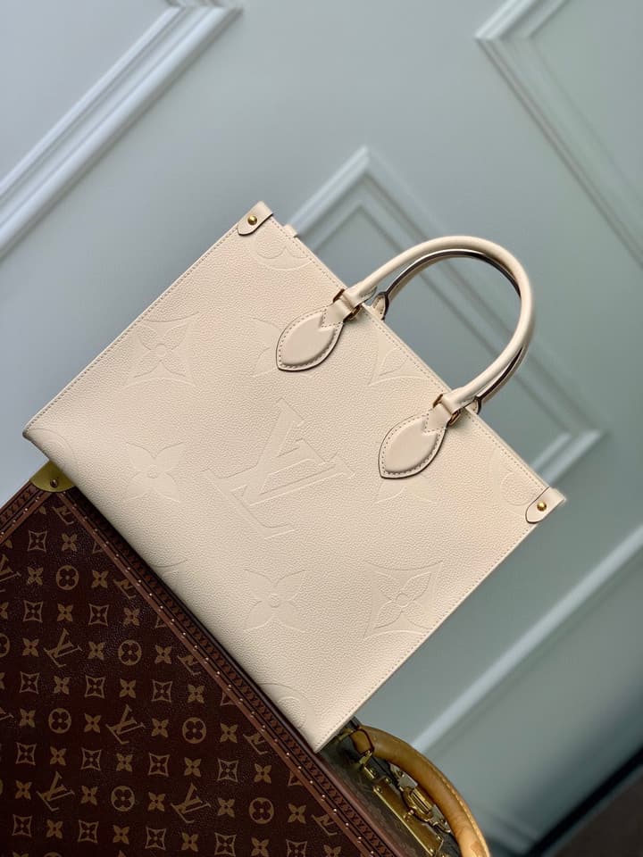 Louis Vuitton OnTheGo Medium Monogram Empreinte Tote in Cream Monogram Empreinte