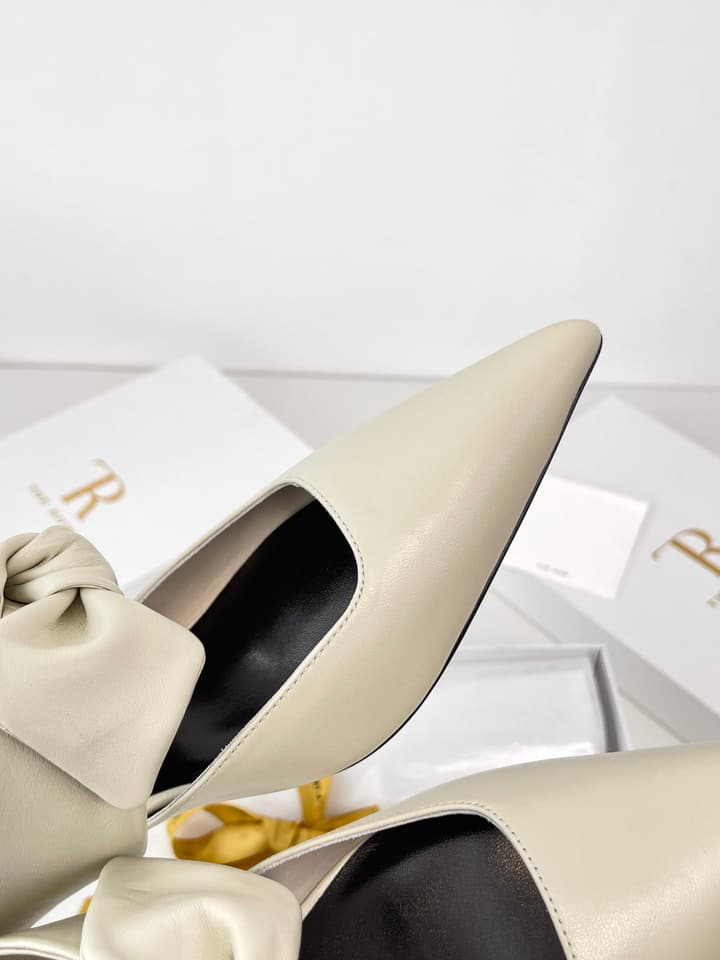 The Row Leather Bow Mules in Black Leather