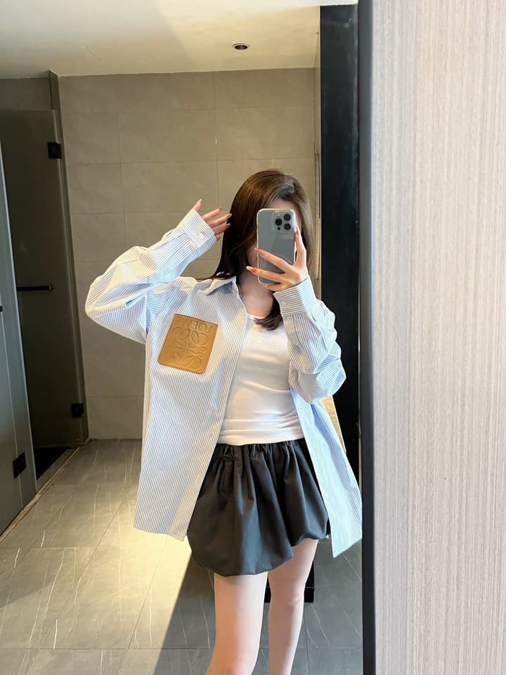 Loewe Embossed Logo Suede Pocket Striped Shirt in Tan Loewe Pouch, Light Blue Overshirt, Black Skirt - View 1