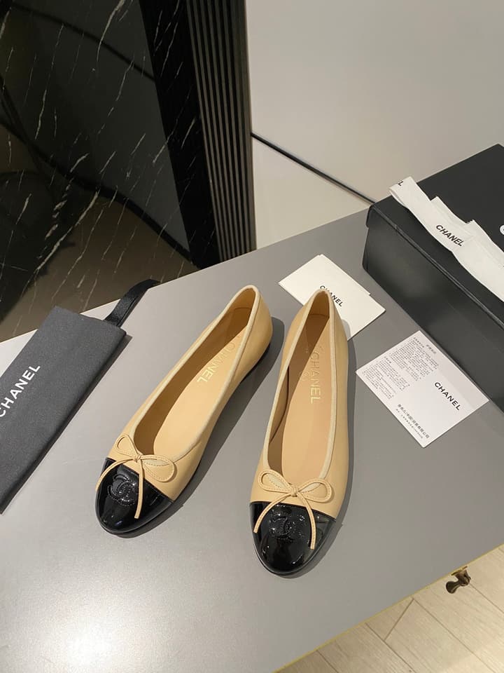 Chanel Classic Ballet Flats in Tan With Black Cap Toe