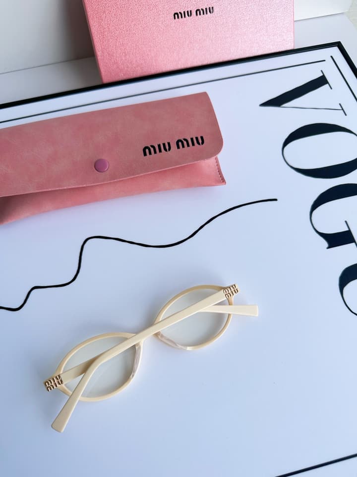 Miu Miu SMU04Z Black Frame Transparent Lens Sunglasses – 2023 Autumn/Winter Collection in Beige