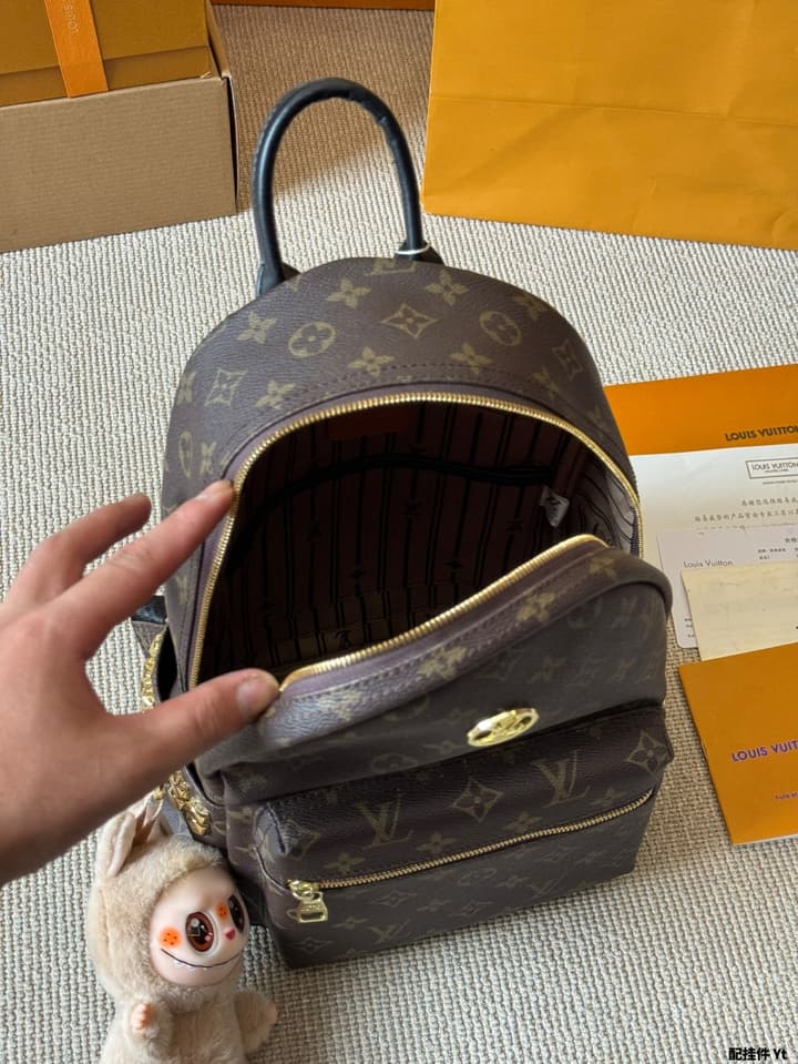 Louis Vuitton Monogram Mini Backpack in Monogram With Light Blue Charm