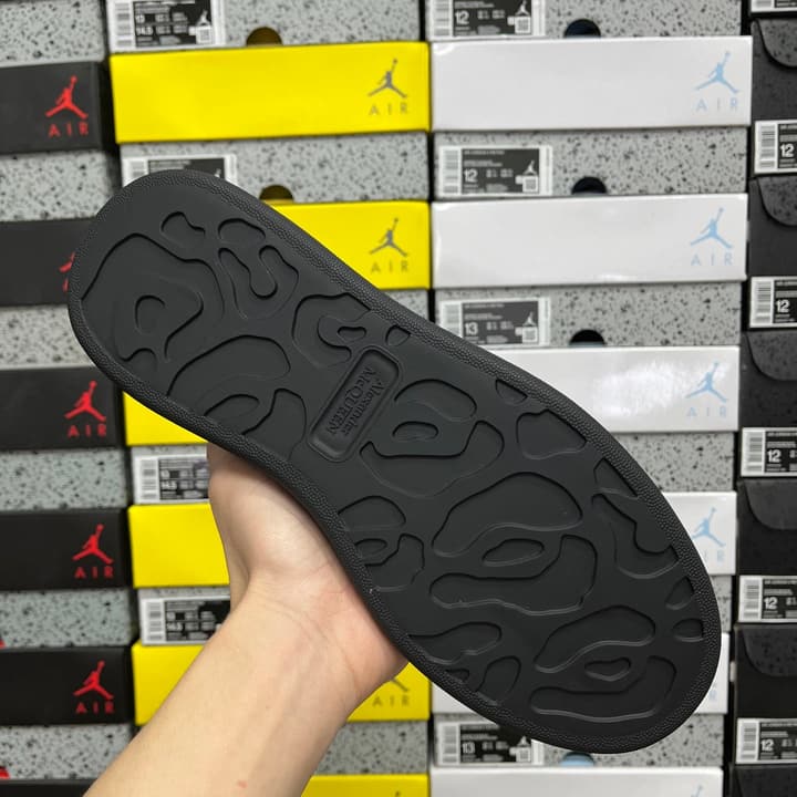 Alexander McQueen Oversized Low-Top Sneakers in All Black With White Sole