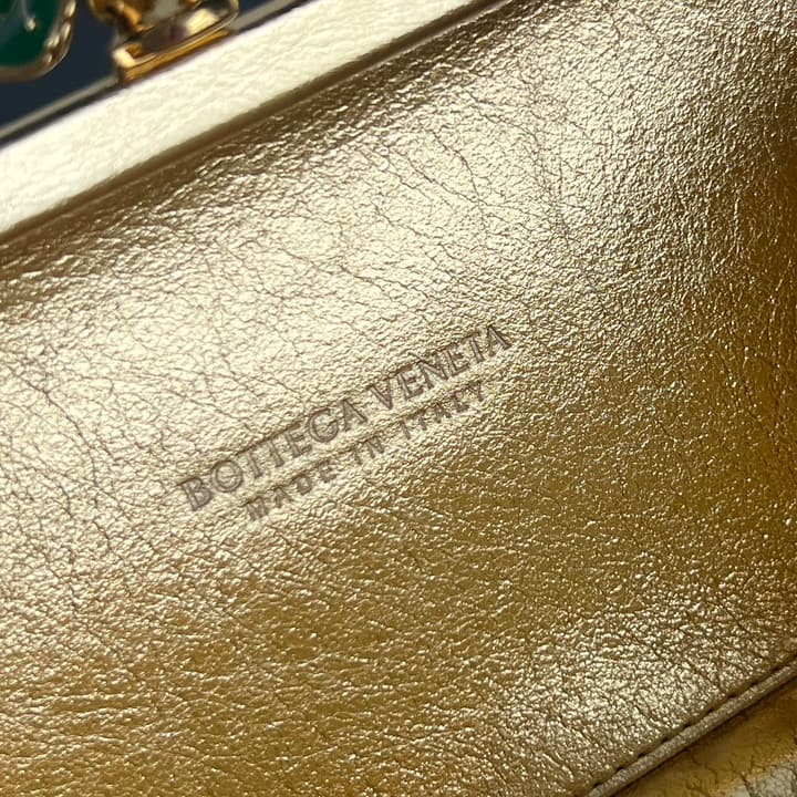 Bottega Veneta Woven Leather Floral Knot Clutch Bag in Gold Woven Leather With Floral Clasp