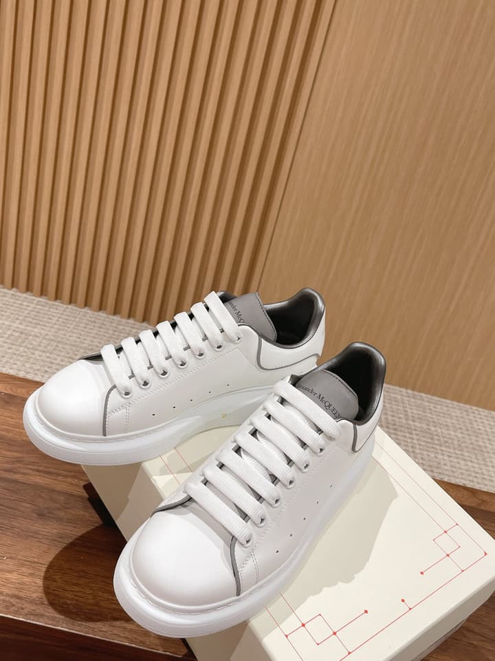 Alexander McQueen Classic Versatile White Sneakers in White With Black Laces & Heel