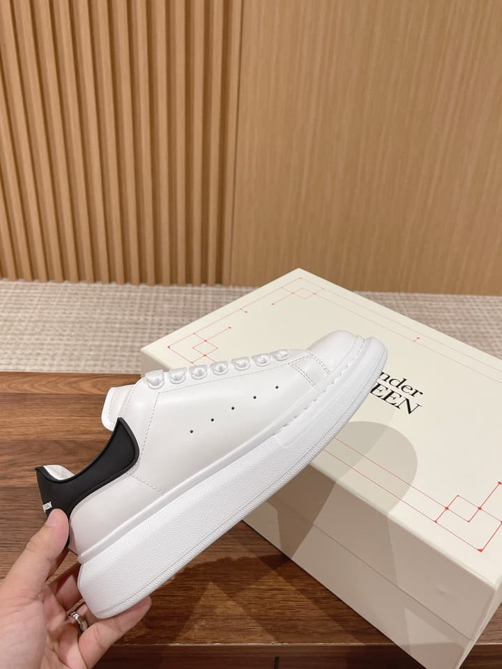 Alexander McQueen Classic Versatile White Sneakers in White With Black Laces & Heel
