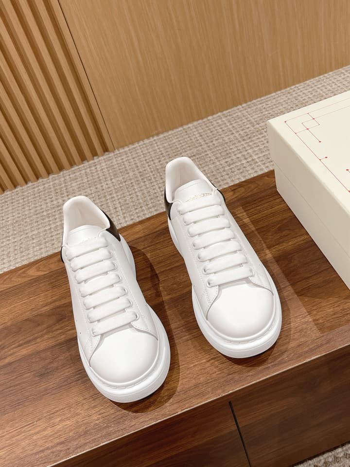 Alexander McQueen Classic Versatile White Sneakers in White With Black Laces & Heel