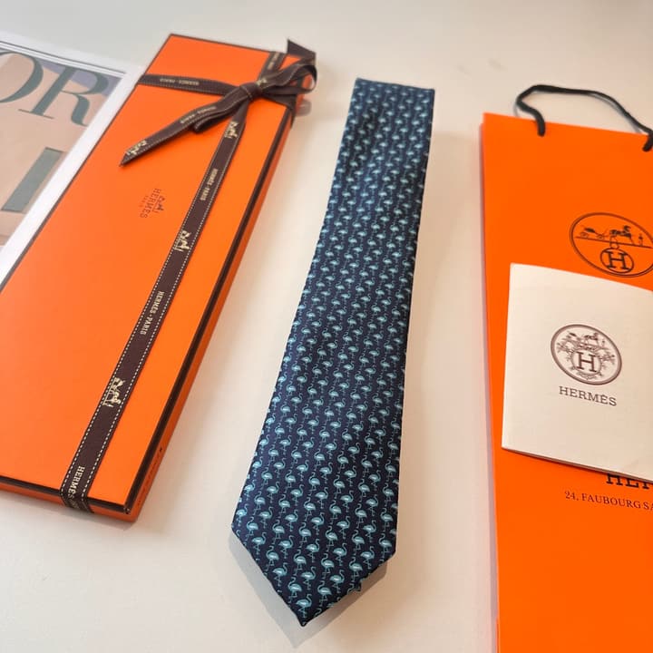 Hermès Animal Series Men's Silk Tie in Blue With Pink Pattern