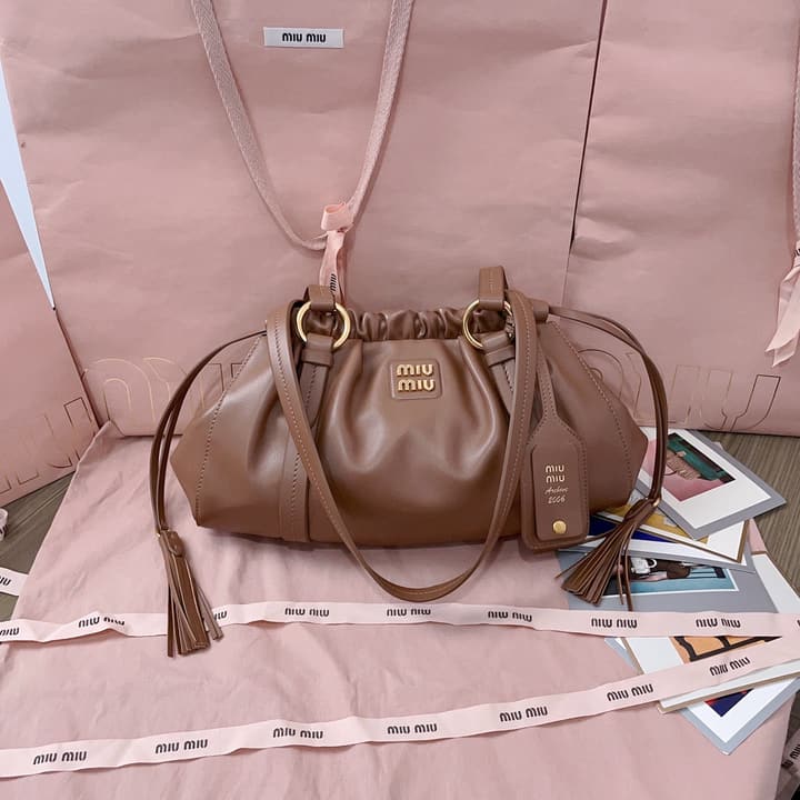 Miu Miu Tassel Drawstring Bucket Bag – New Collection in Black