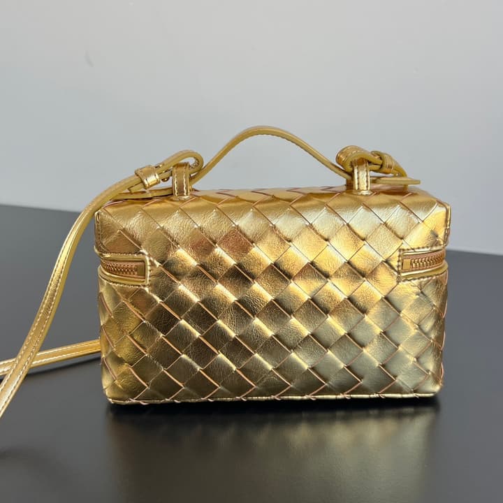 Bottega Veneta Intrecciato Vanity Case in Metallic Gold