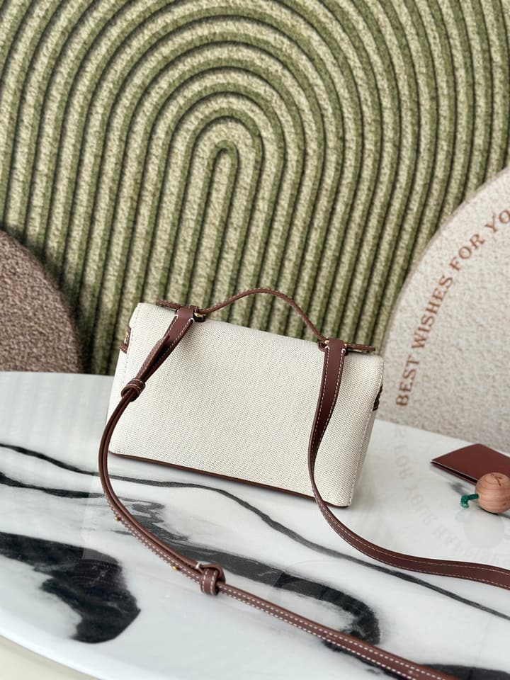 Loro Piana L19 Canvas Crossbody Bag – Spring/Summer Resort Collection in Beige Canvas With Burgundy Trim