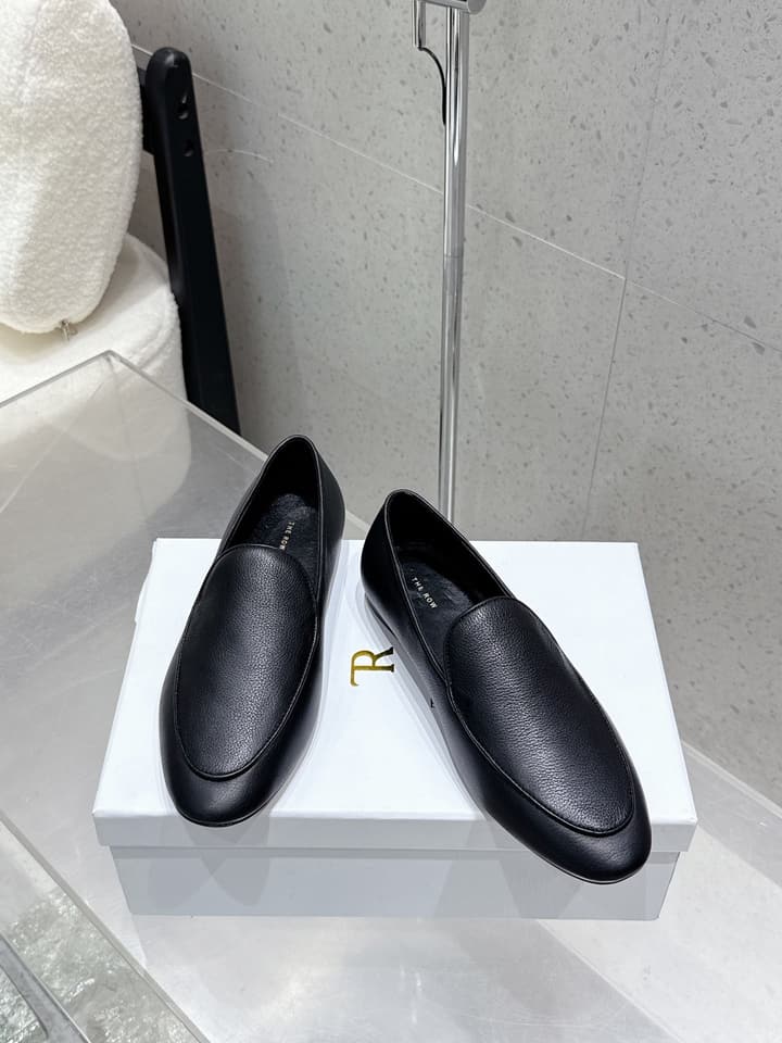 The Row Tassel Loafers in Black Suede