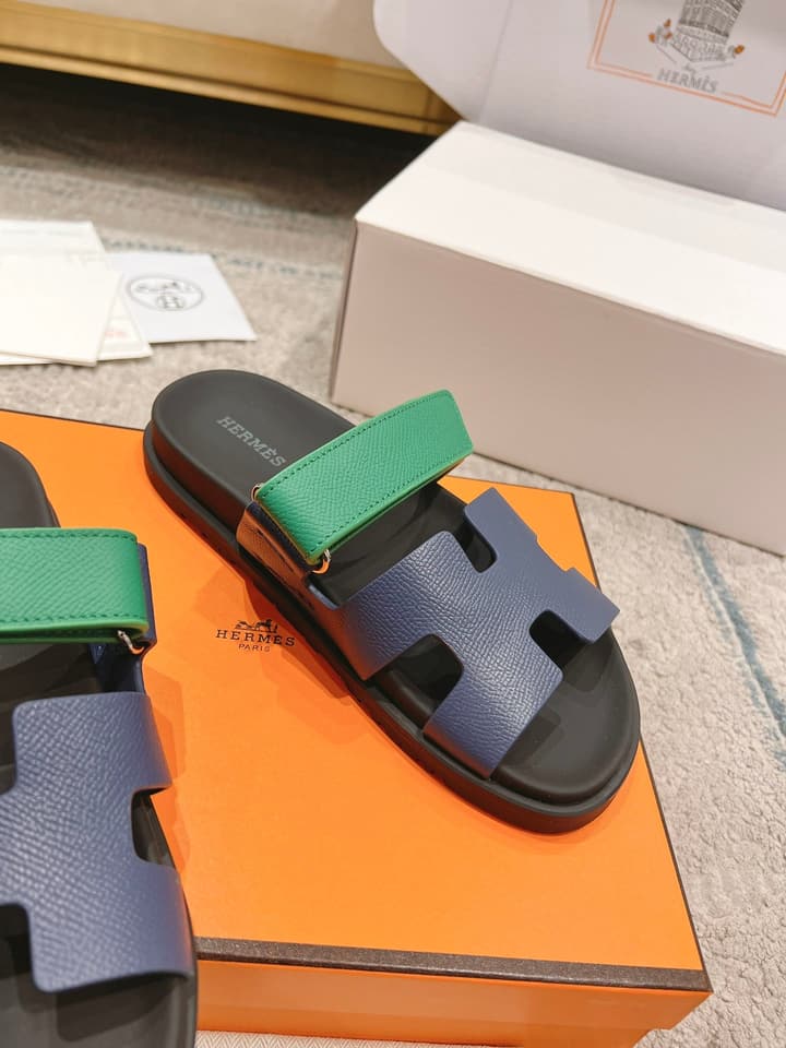 Hermès Chypre Suede Unisex Slides in Black With Dark Blue Strap