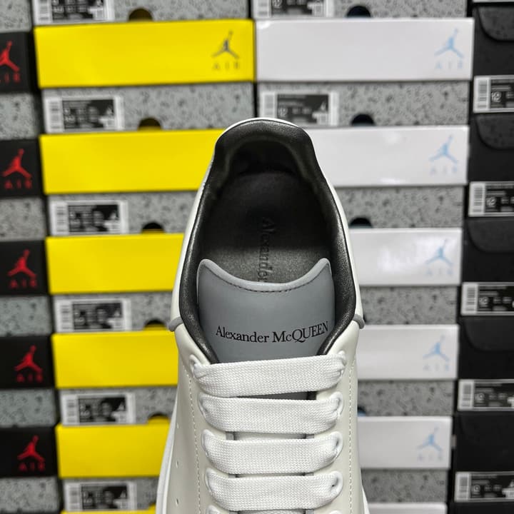 Alexander McQueen Oversized Low-Top Sneakers in All Black With White Sole