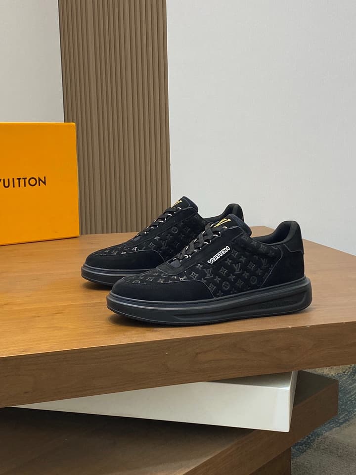 Louis Vuitton Embossed Calfskin Sneakers in Black